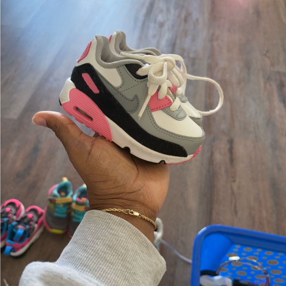 Pink and whiter baby nike shoes